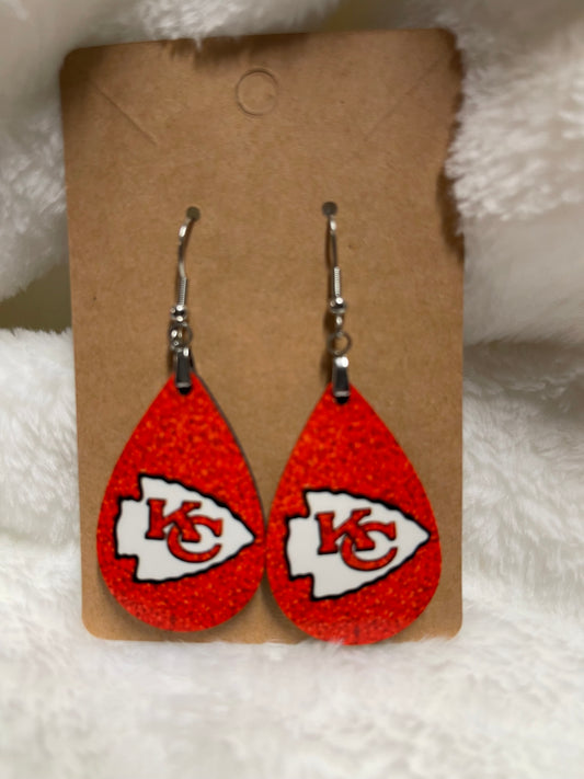 red KC earrings